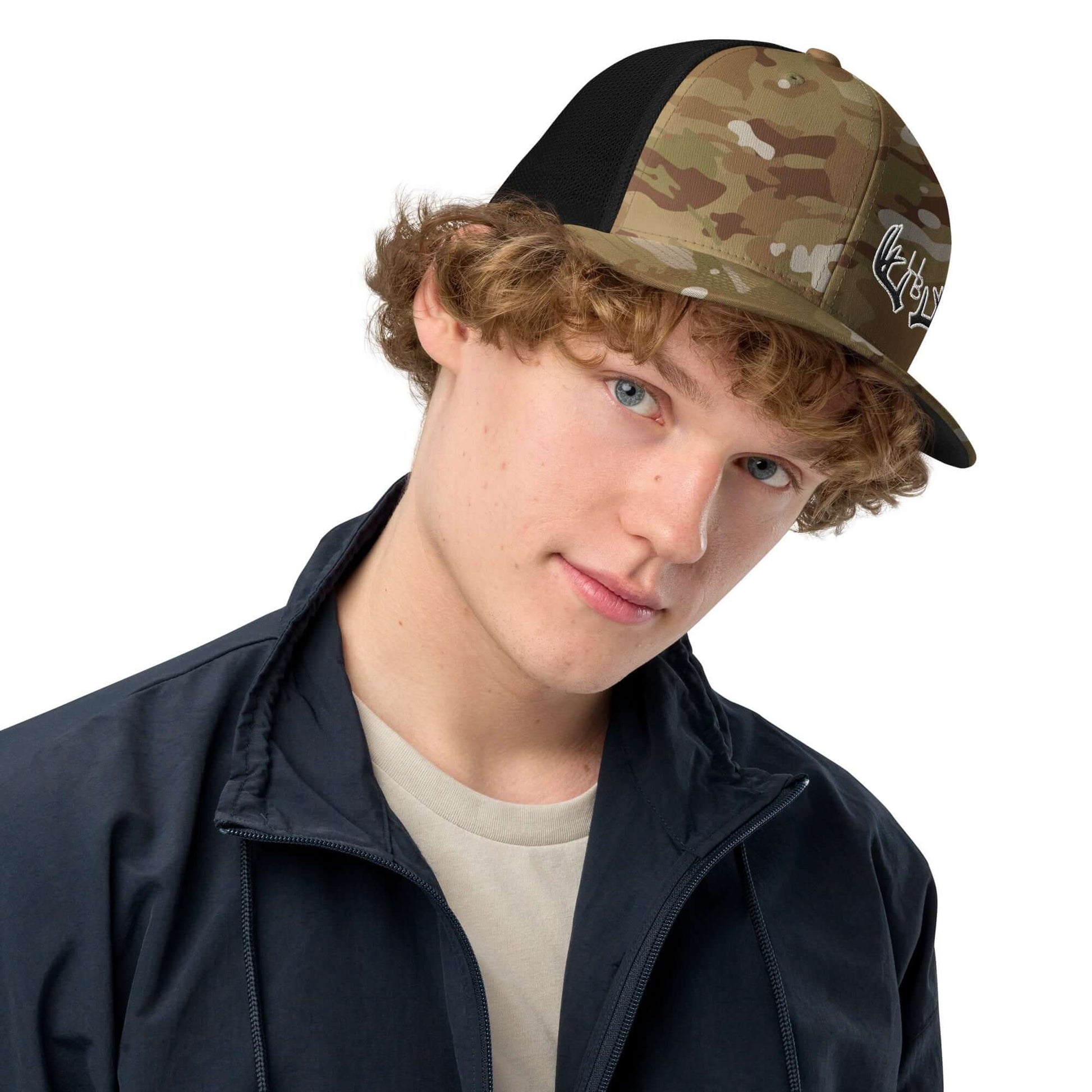 4B Antlers Flexfit Mesh Trucker Hat Be it the iconic Y2K fashion era or the everchanging 2020s—a classic trucker cap always seems to find a place in the fashion world. This mesh back trucker cap has that trendy yet timeless style and a mesh back that’ll e