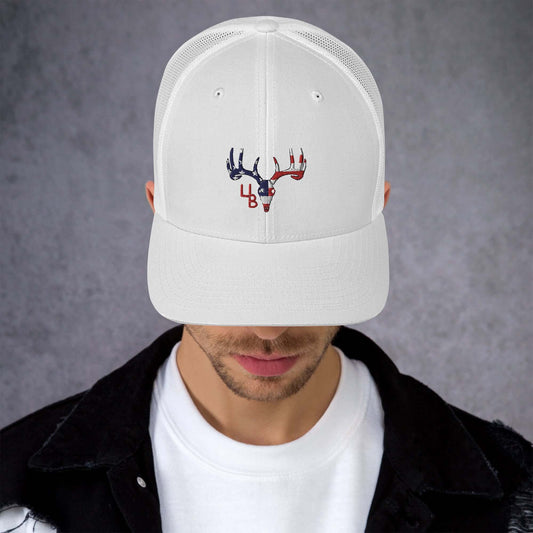 4B Americana Deer Trucker Hat This six-panel trucker cap with a mesh back will be a comfy and classic choice for a perfect day in the sun. • 60% cotton, 40% polyester • Mid-profile cap with a low-profile embroidery area • Structured, six-panel cap • 3.5″